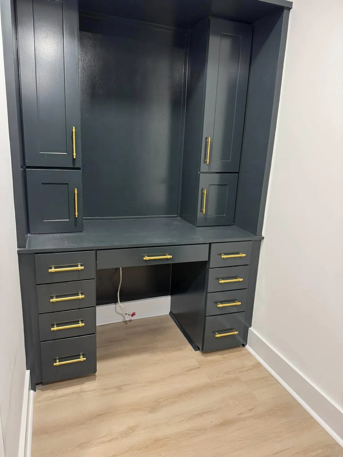 A built-in desk in a dressing room